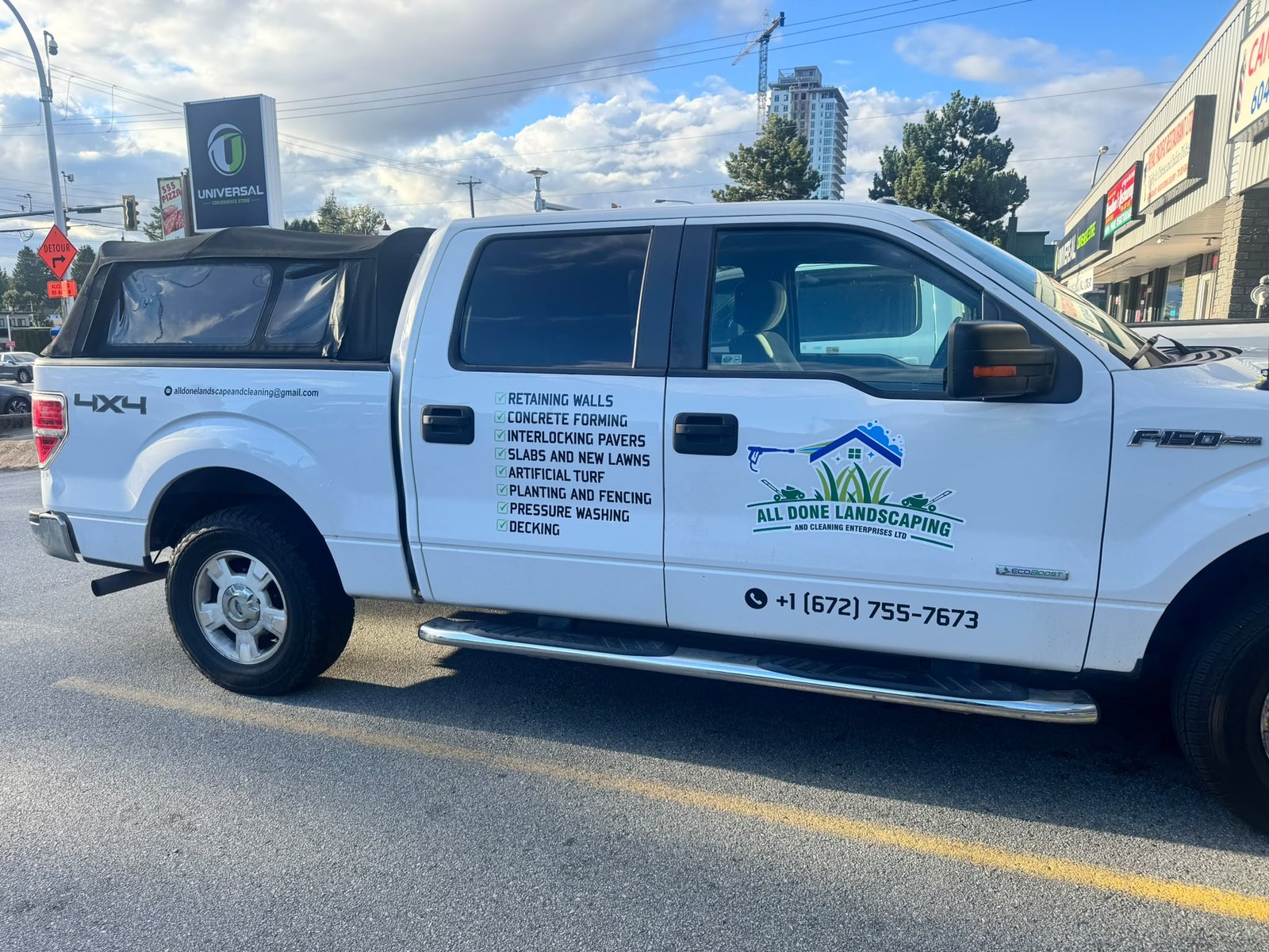Landscaping pickup with business graphics