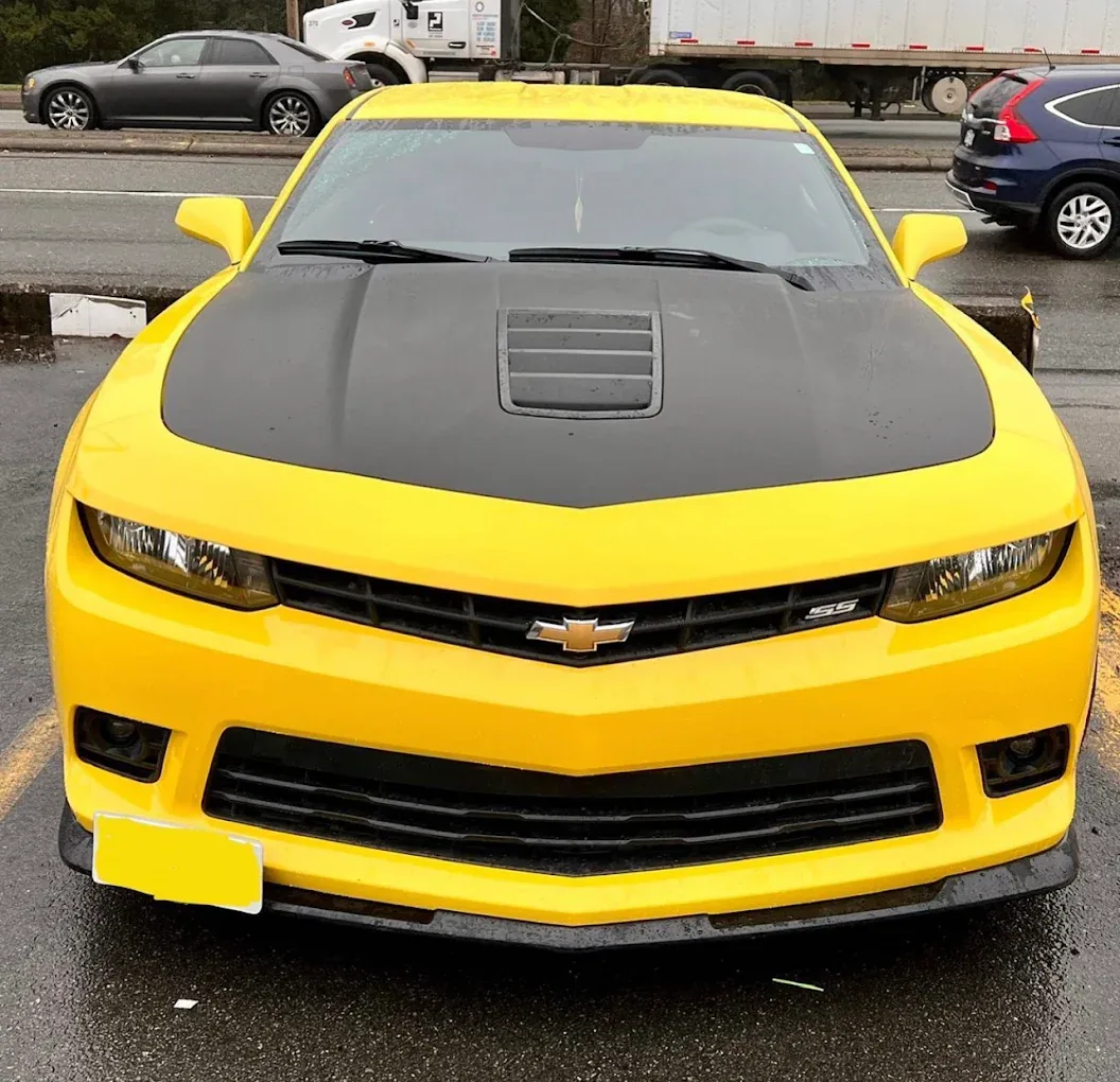 Chevrolet Camaro with a black hood accent completed in Surrey