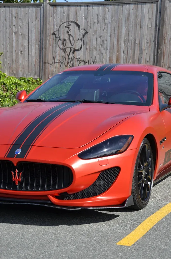Maserati GranTurismo with custom racing stripes completed by Apna Customs in Surrey